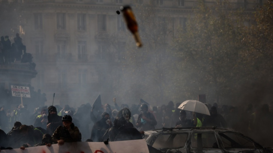 France counts cost of violent protests, 1,800 arrested