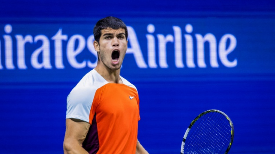 Alcaraz into US Open last-eight after early morning epic