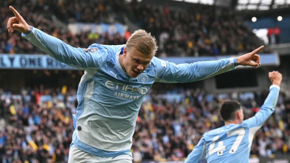 Angleterre: Manchester City et Liverpool gagnent en serrant les dents