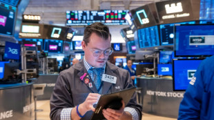 Wall Street termine sans direction, limitant les d&eacute;g&acirc;ts apr&egrave;s un indicateur d&eacute;cevant