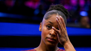 Blakely vaults out of the shadow of Biles for all-around world title