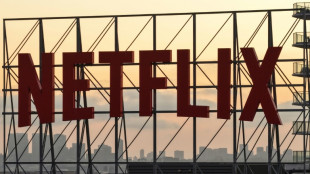Global stocks mostly fall on lackluster results from Netflix, others