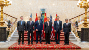 Asian markets extend gains as China-US talks head into second day