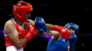 Boxeadora Imane Khelif &eacute; 'modelo' de coragem para o povo argelino