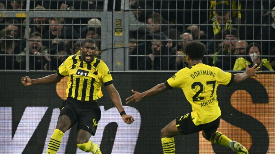 Dortmund snatch Bayern draw with with last-gasp Modeste equaliser