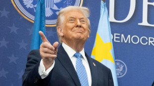 Trump revels in peace institute renamed after himself