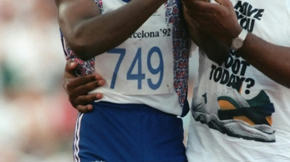 Tributes paid on death of Jim Redmond, who helped son hobble to Olympic finish line