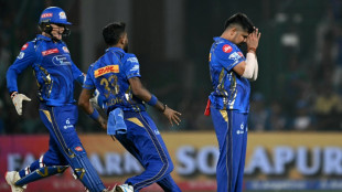 Kohli, Karn star as Bengaluru and Mumbai win in IPL