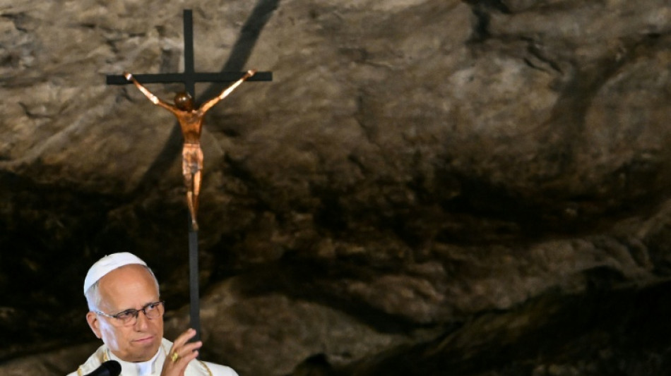 Pope prays at Lourdes after huge Paris mass