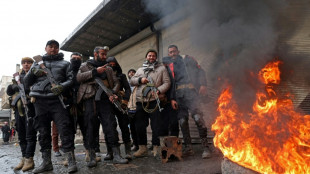 Kurdish forces withdraw from Syria's largest oil field as govt forces advance