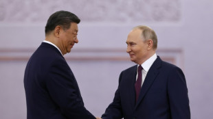Putin recebe Xi no Kremlin; Ucrânia denuncia violação da trégua