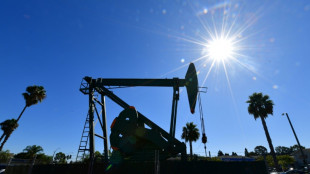 Oil prices higher, stocks flat ahead of inflation report