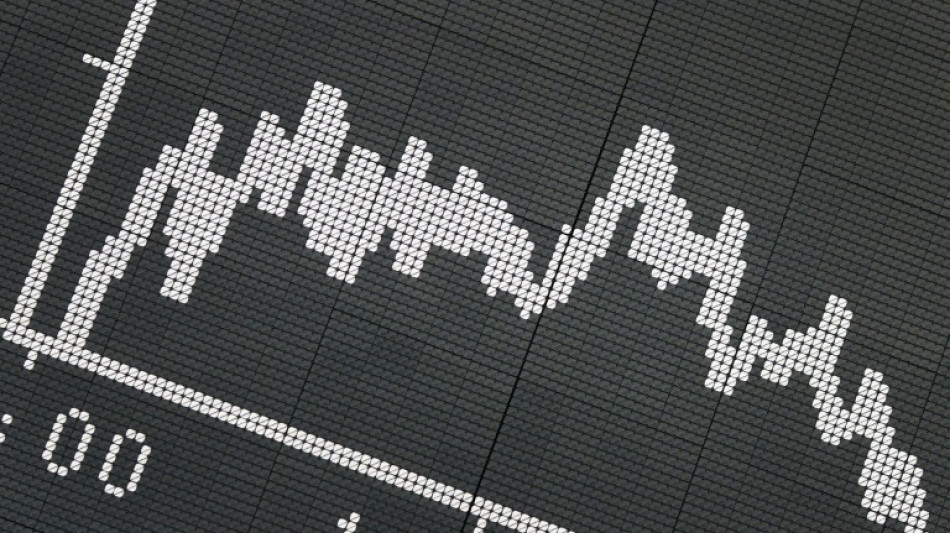 Global stocks slide as traders eye more US rate hikes