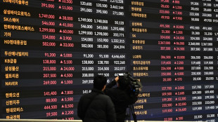 Oil nears $115 with stocks mixed on earnings, AI