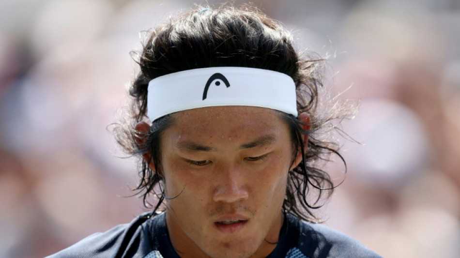Zhang becomes China's first man in tennis top 100